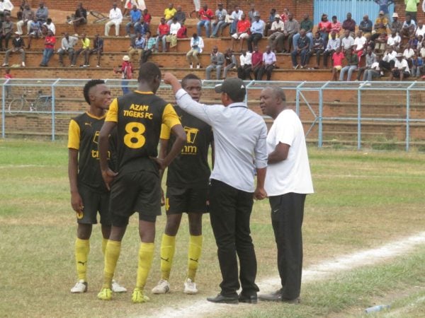 Coach Gerald Phiri tips his charges during the game.- Photo by Akex Mwazalumo