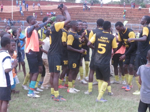 Tigers celebrate after defeating Eagles.- Photo by Alex Mwazalumo