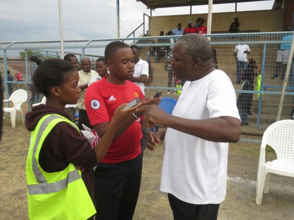 Tigers technical director  Robin 'Abambo' Alufandika speaking to journalists after Sunday's victory.-Photo by Alex Mwazalumo