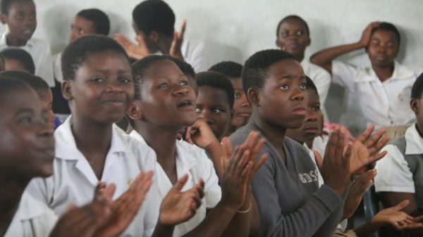 Students clapss hands after the donation