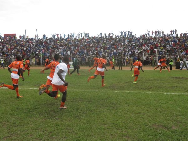 Wanderers rush to their fans after the last penalty -Pic Alex Mwazalumo