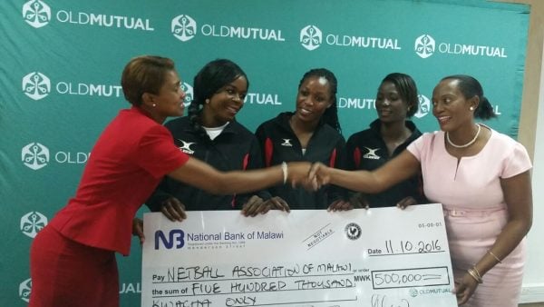 Phoya presenting the cheque
