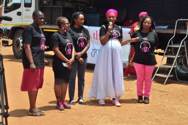 Khondowe (in white dress) and Think Pink Malawi team.