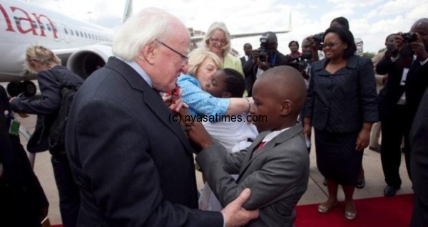 President Michael D Higgins and his wife Sabina on their arrival to Kamuzu International Airport in Lilongwe, Malawi. Photograph: Chris Bellew / Copyright Fennell Photography 2014