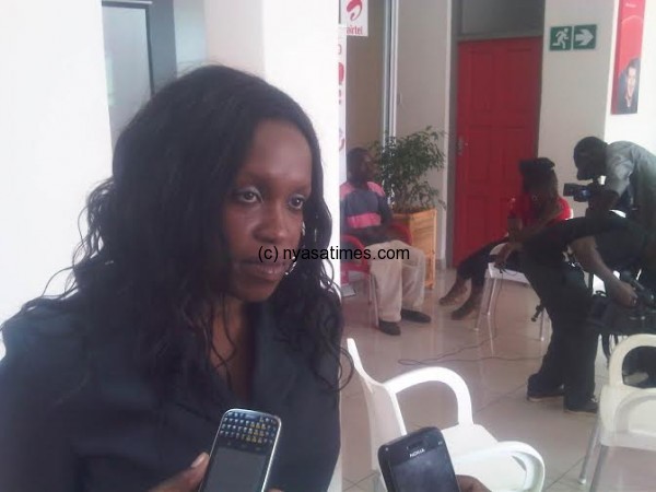 Airtel's Isabel Kachinjika briefing the media on Tuesday during the fourth Tisangalale draw.