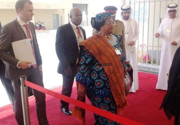 President Banda makes way into the conference venue in Abu Dhabi