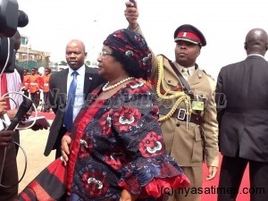 President Banda addressing journalists before departure