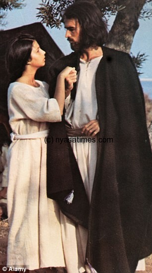 Jesus and Mary are portrayed by actors in a scene from movie The Messiah 