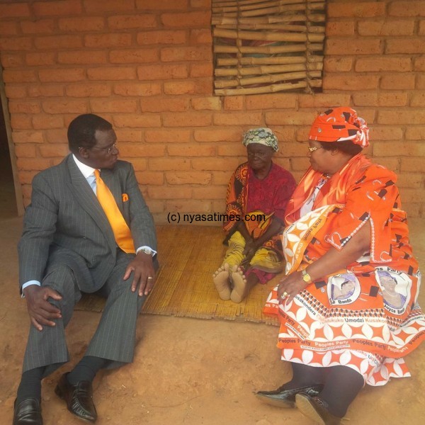 The First Couple with a woman they are  building a new home under MTT