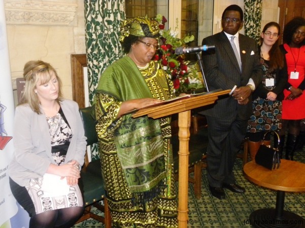 The President, flanked by Pamela Nash MP, Chair of the All- Party Parliamentary Group, United Kingdom (R) and First Gentleman and Retired Chief Justice Richard Banda, SC