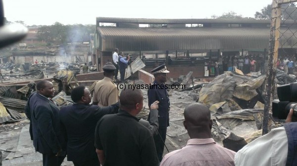 Inspector General of Police Loti Dzonsi visits the gutted market