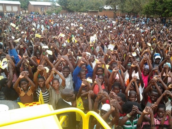 Supporters in the Lower Shire for Atupele showing the UDF symbol of clasped hands