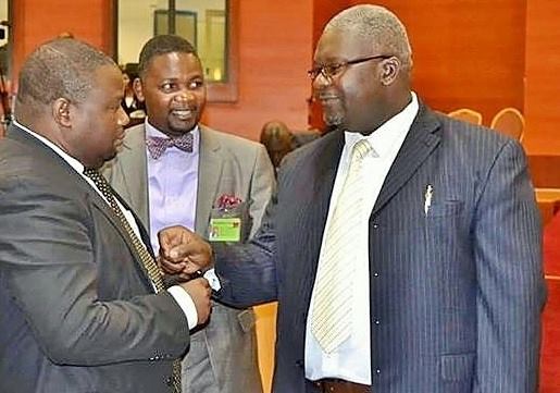 Lucius Banda (right) with Information Minister Kondwani Nnakhumwa: UDF swallowe up to the head