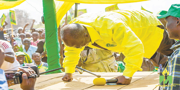 President of Tanzania Dr John Magufuli engages in press-up at a rally 
