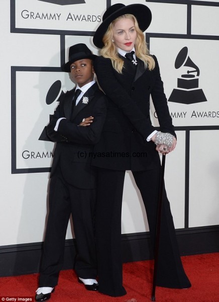 Dapper duo: Madonna brought her eight-year-old son David Banda as her date to the Grammy Awards and the duo dressed in matching Ralph Lauren suits  