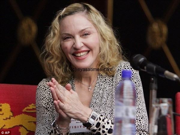 Madonna:  Donate through Unicef