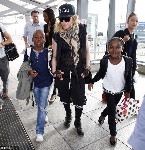 Madonna and her Malawian adopted children David Banda and Mercy James