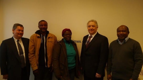 Pictured from left Professor James Sommerville, Sabron Kalyolyo and Grace Sukasuka, Tony Kilpatrick GCU's Head of the Department of Construction and Surveying, and, of course, Lecturer Malawi Ngwira.