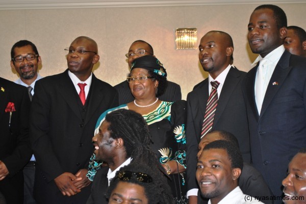 Malawians living and studying in Japan pose for a photograph with President Banda