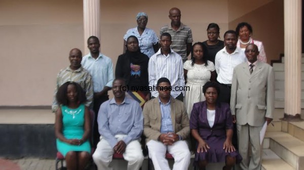 Group photo of participants with Duwa and NDI country director Taona Mwanyisa in front 