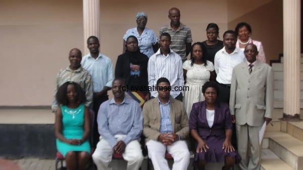 Group photo of participants with Duwa and NDI country director Taona Mwanyisa in front 