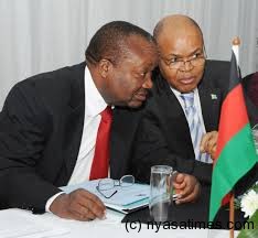 Mkondiwa (left) : Now chief secretary to government