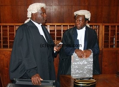 Modecai Msiska (right) represented FMB in the case the bank has  finally lost