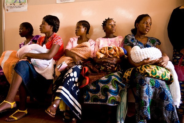 Mothers wait to have their babies weighed at the Bwaila maternity clinic, Malawi. –Photo by The Global Fund / John Rae