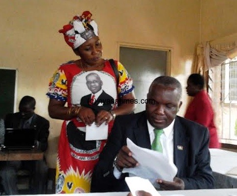 Msowoya presenting his papers