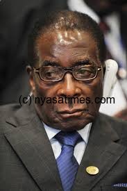 Mugabe 'Shocked,  disgusted' by SA's xenophobic violence him an idiot?