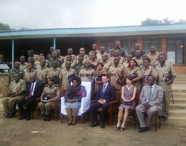 Nevin and Ngauma (seated front row) pose for picture with the participants