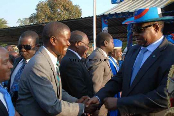 Mutharika greets Ngumuya at the venue of the rally