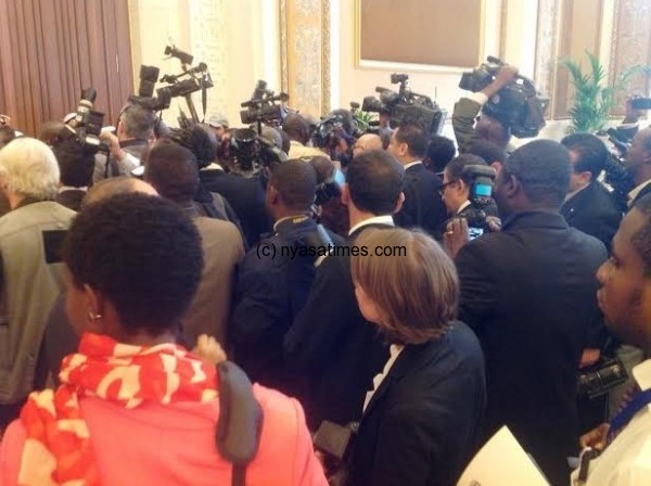 There was pandemonium as tens of photojournalists wanted to take photographs of their Heads of State at the opening ceremony of the Summit