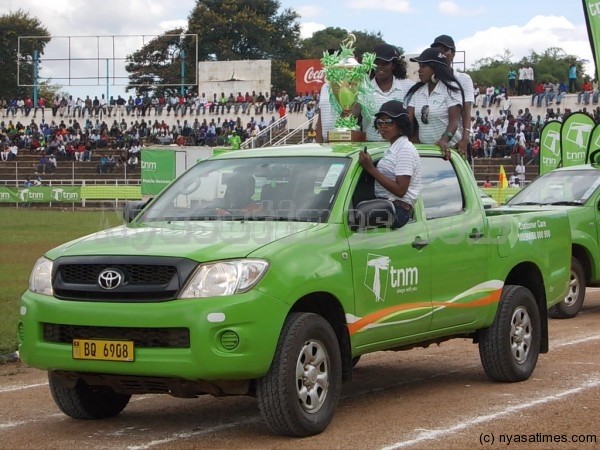 Parading the TNM Super League trophy before the match