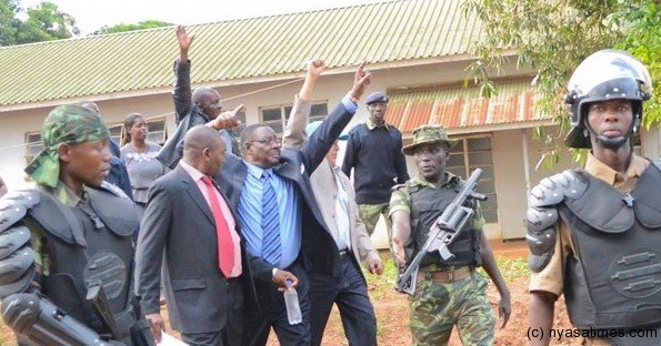 Treason suspect Peter Mutharika at the court
