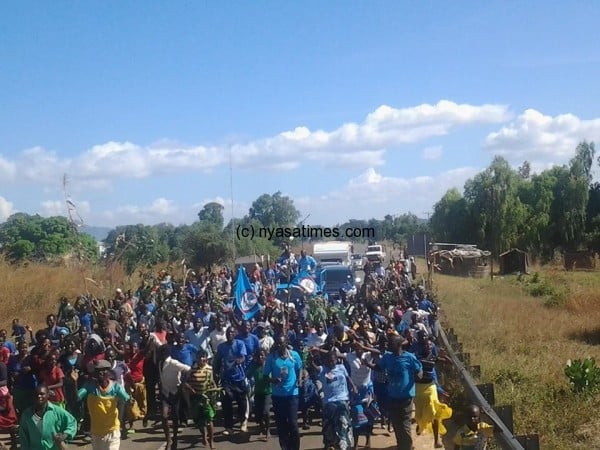 Mutharika being cheered  by supporters on whistke stop