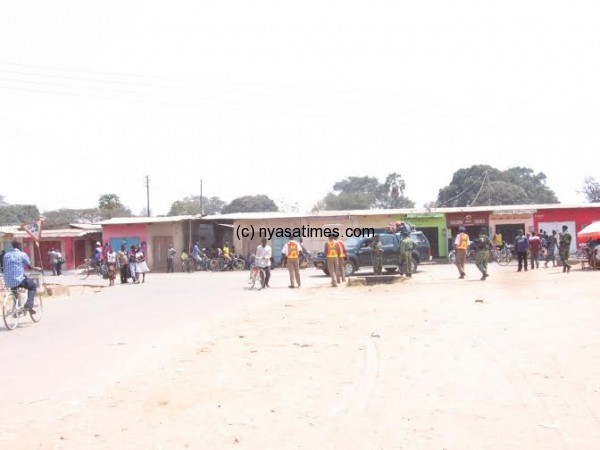 Police at the closed market of karonga