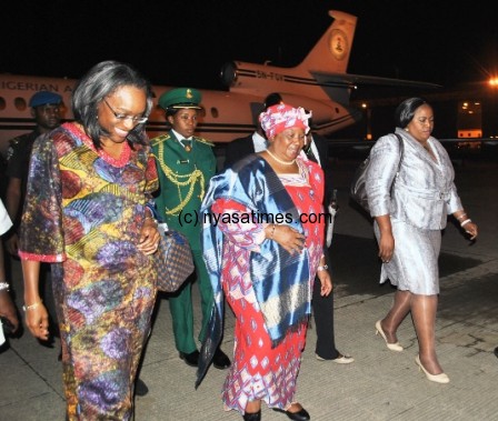 President Banda welcomed by Minister of Communication Technology Omobola Johnston (Left) and Malawi Charge De Affairs to Nigeria Doreen Kapanga (R) - Pic by Joseph Josiah