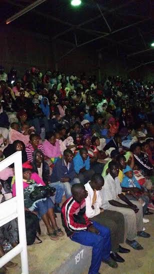Returnees at Kamuzu Stadium being addresed by Minister of Home Affairs Atupele Muluzi