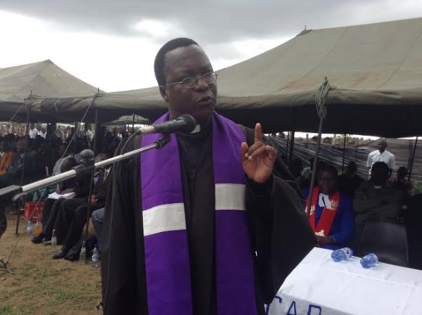 The clergy preaching at the ceremony