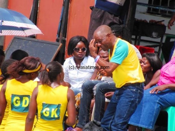Diamonds coach Saenda giving tactical advises to the players during recess.-Photo by Jeromy Kadewere