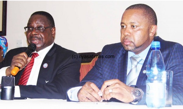 President Mutharika (left) and  his vice president  Saulos Chilima: Will not receive new salary under current economci situtaion