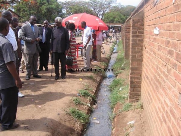 Visiting the drainage system of Karonga market
