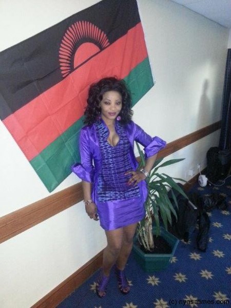 London based Phylis Chipojola posing  in Lilly Alfonso's dress