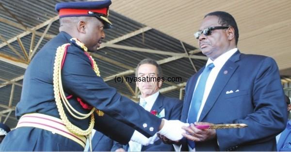Mutharika receives a sword of authority from Army chief Odillo