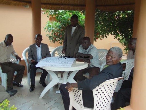  T/A Dzoole, 2nd from left, discussing with his subjects at the meeting.