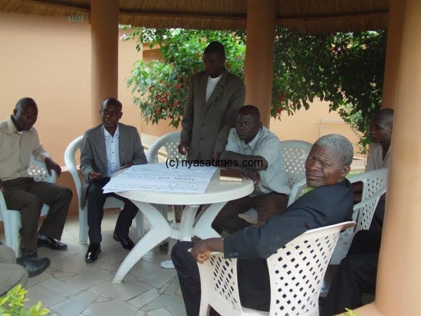 T/A Dzoole, 2nd from left, discussing with his subjects at the meeting.