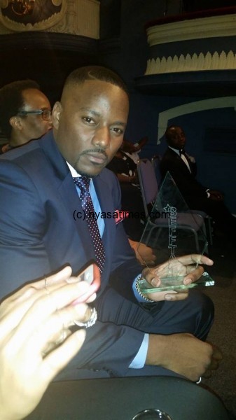 Tay Grin shows off his Beffta award