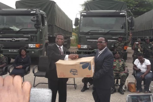 Tanzanian Ambassador to Malawi Patrick Sele handed over the gift to Chiunguzeni.- Photo by Tiwonge Kumwenda, Nyasa Times
