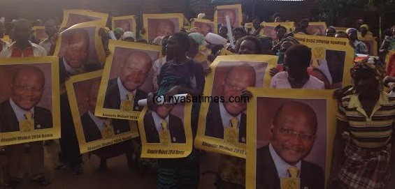 Defectors carrying UDF president Atupele Muluzi's posters